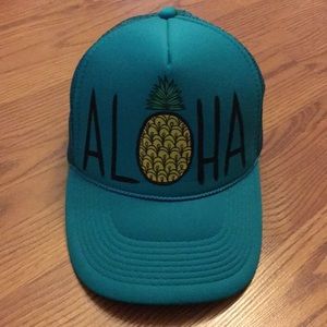 Al🍍ha trucker style hat.